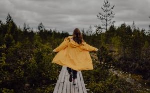 woman walking down path